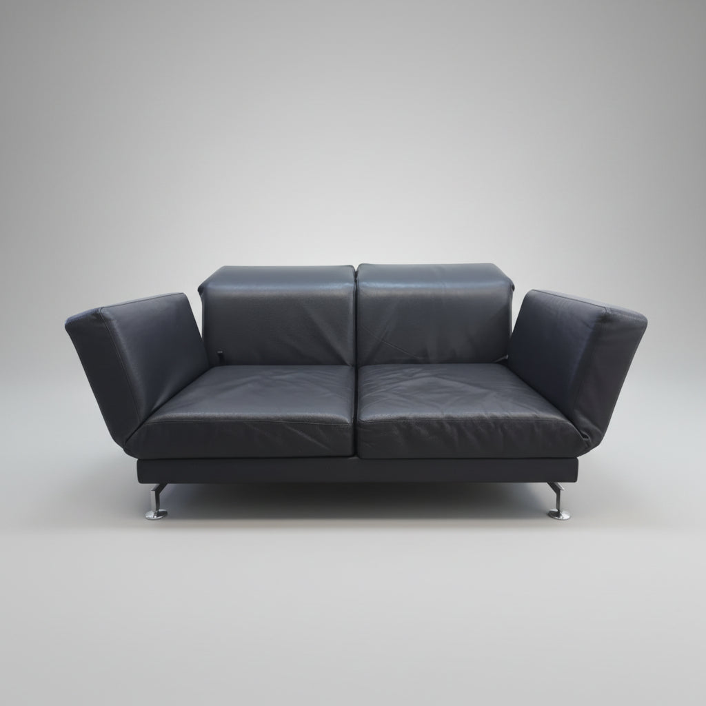 Brühl Moule Sofa aus schwarzem Leder mit Daybed Funktion