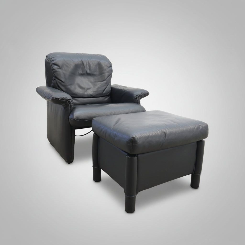 Cor Ledersessel mit Hocker aus schwarzem Leder