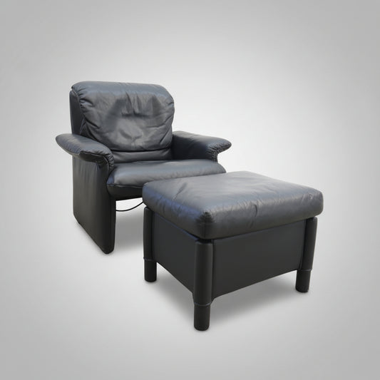 Cor Ledersessel mit Hocker aus schwarzem Leder